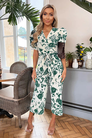 AX PARIS CREAM AND GREEN PRINTED WRAP OVER TIE WAIST JUMPSUIT