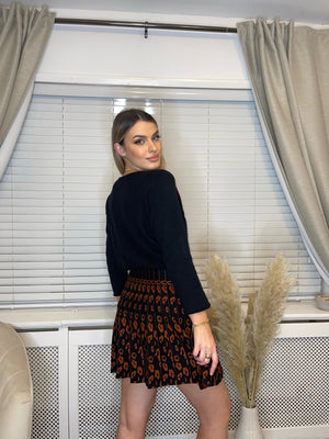 RUST PATTERNED KNITTED PLEATED SKIRT